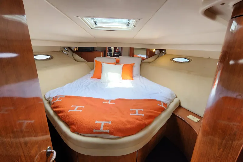 Euphoria 1 Yacht Photos Pics Luxurious cabin interior of 2000 Sea Ray 540 Sundancer yacht with cozy bedding.