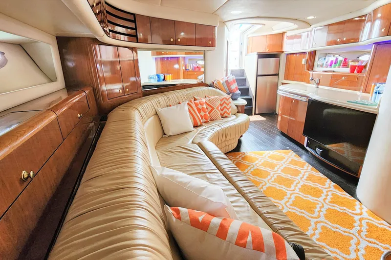 Euphoria 1 Yacht Photos Pics Luxurious interior of 2000 Sea Ray 540 Sundancer yacht with plush seating and modern amenities.