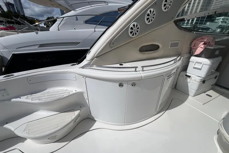 Euphoria 1 Yacht Photos Pics Luxurious interior of 2000 Sea Ray 540 Sundancer yacht with sleek white cabinetry.