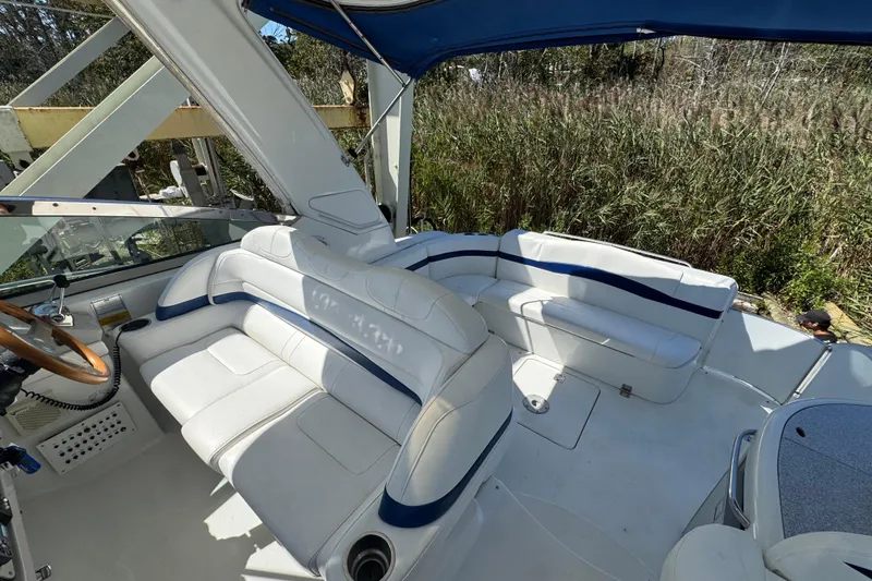  Yacht Photos Pics 2006 Formula 40 Performance Cruiser interior with white seating and blue accents.
