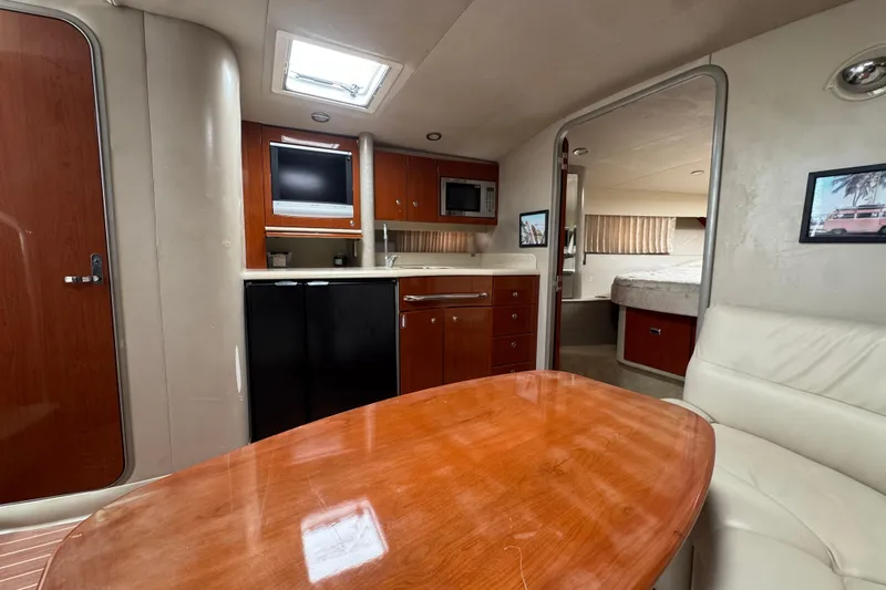  Yacht Photos Pics Interior of 2006 Formula 40 Performance Cruiser with wood finishes and modern amenities.