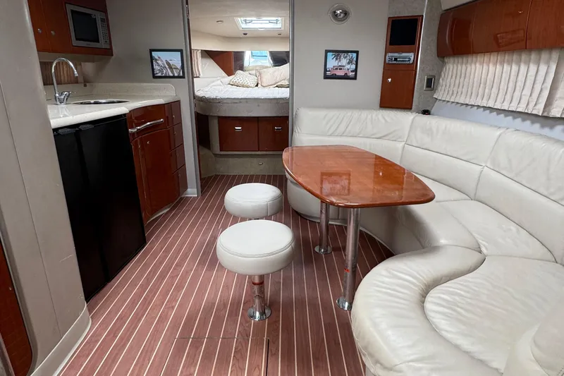  Yacht Photos Pics Interior of a 2006 Formula 40 Performance Cruiser with modern kitchen and cozy seating area.