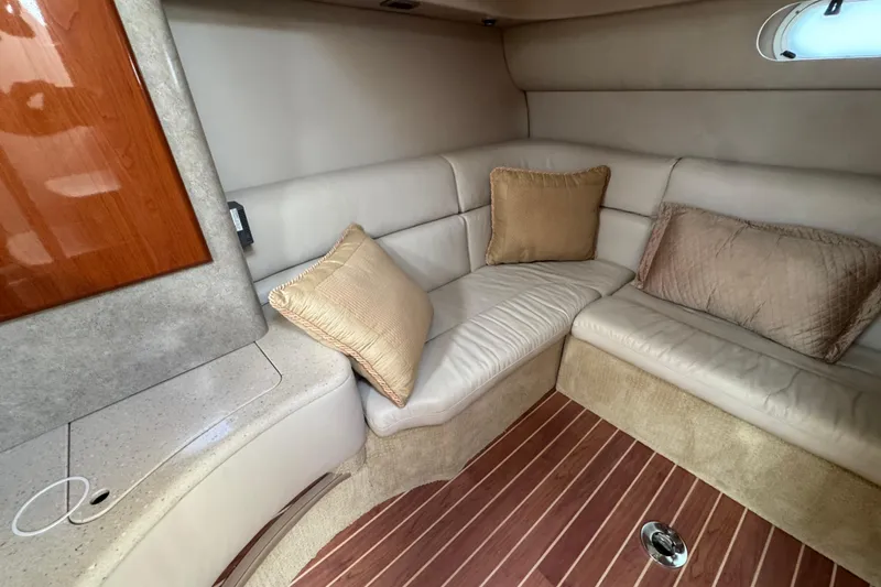  Yacht Photos Pics Luxurious interior of 2006 Formula 40 Performance Cruiser with plush seating and cushions.