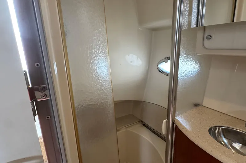  Yacht Photos Pics Interior of 2006 Formula 40 Performance Cruiser bathroom with shower and sink.