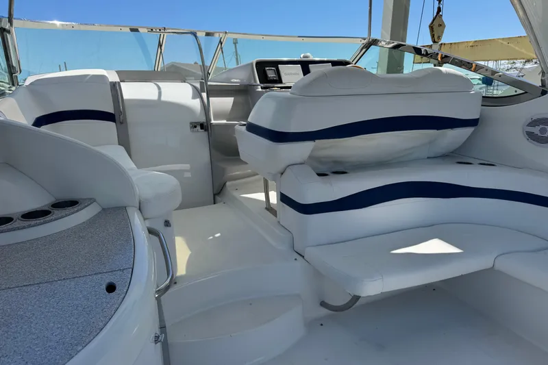  Yacht Photos Pics Interior of a 2006 Formula 40 Performance Cruiser with white seating and blue accents.