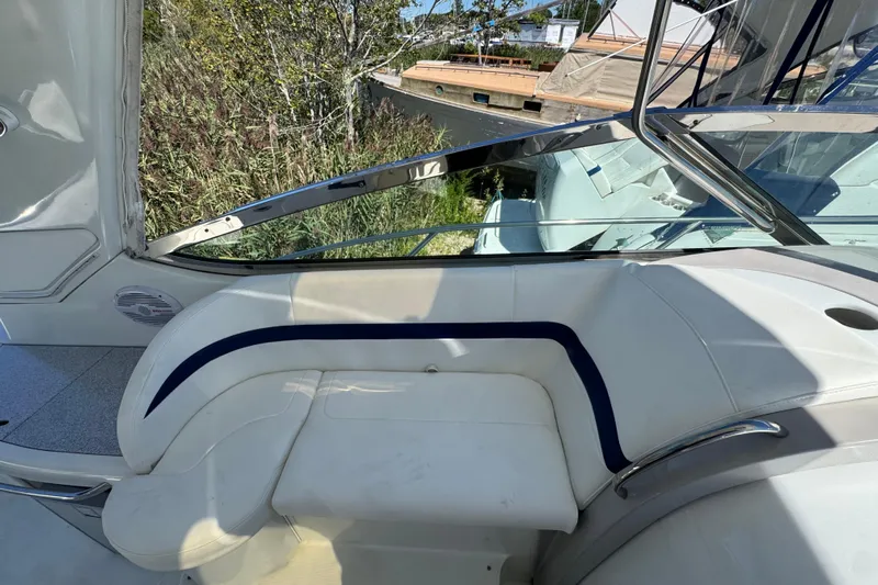  Yacht Photos Pics Interior of 2006 Formula 40 Performance Cruiser with white seating and blue accents.