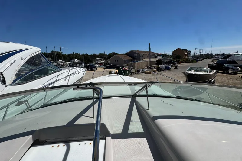  Yacht Photos Pics 2006 Formula 40 Performance Cruiser docked, showcasing sleek design and marina surroundings.