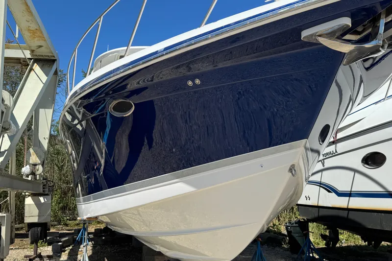  Yacht Photos Pics 2006 Formula 40 Performance Cruiser boat on dry dock, blue and white hull.