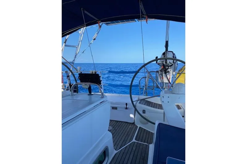 Kolibri Yacht Photos Pics 2006 Jeanneau Sun Odyssey 45 sailboat cockpit with ocean view.