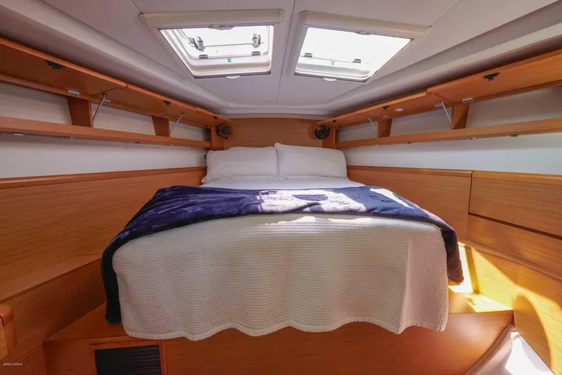 Star IV Yacht Photos Pics Luxurious cabin interior of 2010 Jeanneau Sun Odyssey 50 DS sailboat.