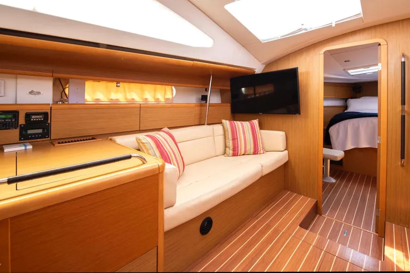 Star IV Yacht Photos Pics Interior of 2010 Jeanneau Sun Odyssey 50 DS yacht with cozy seating and modern amenities.