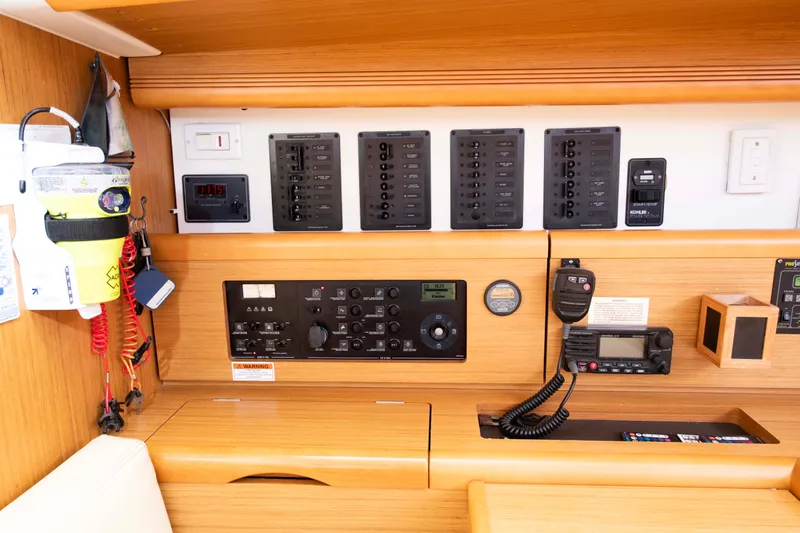 Star IV Yacht Photos Pics Control panel of a 2010 Jeanneau Sun Odyssey 50 DS sailboat, featuring navigation and communication equipment.