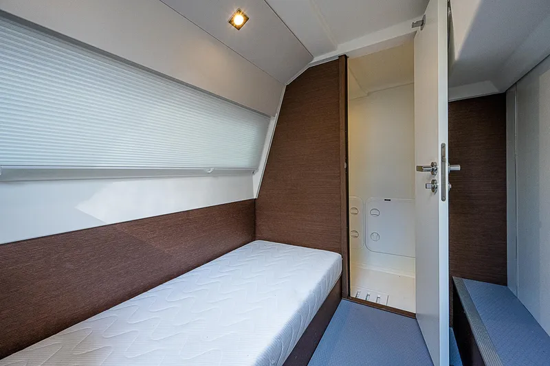 Miss K Yacht Photos Pics 2022 Prestige 520 Fly cabin interior with single bed and ensuite bathroom.