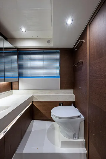 Miss K Yacht Photos Pics Luxurious bathroom in 2022 Prestige 520 Fly yacht with modern fixtures and sleek design.