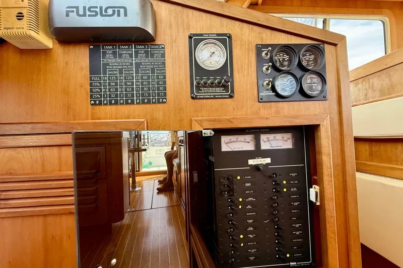 Daystar Yacht Photos Pics Control panel of a 2001 Sabre Sabreline 34 boat, featuring gauges and switches.