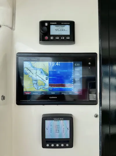 Waves III Yacht Photos Pics Control panel of a 2017 Maritimo M51 yacht with navigation and monitoring displays.