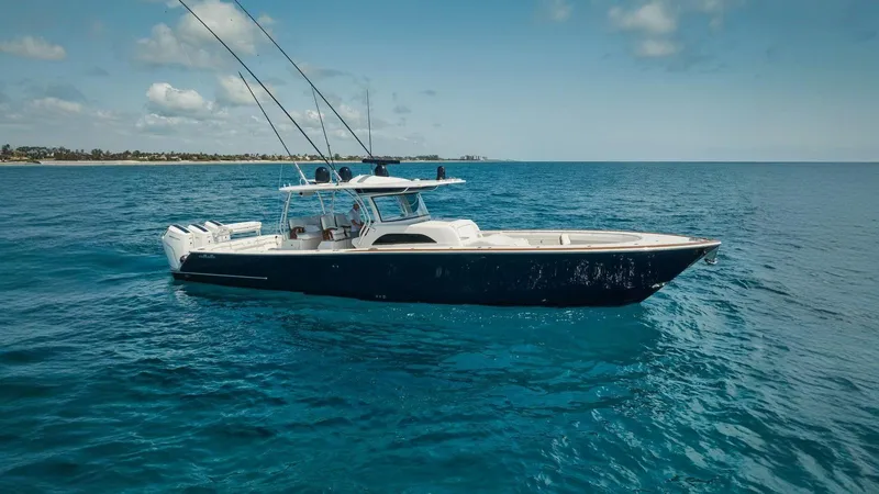 Bulldawg Yacht Photos Pics 2023 Valhalla Boatworks V-46 cruising on open blue ocean waters.