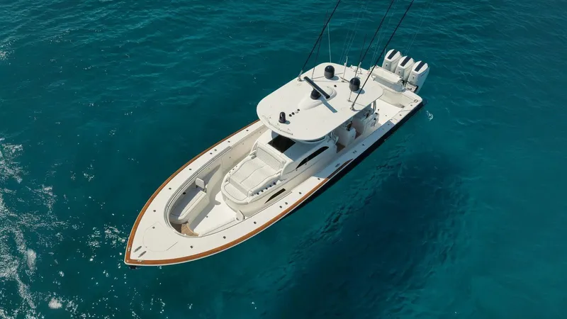 Bulldawg Yacht Photos Pics 2023 Valhalla Boatworks V-46 yacht on clear blue water, aerial view.