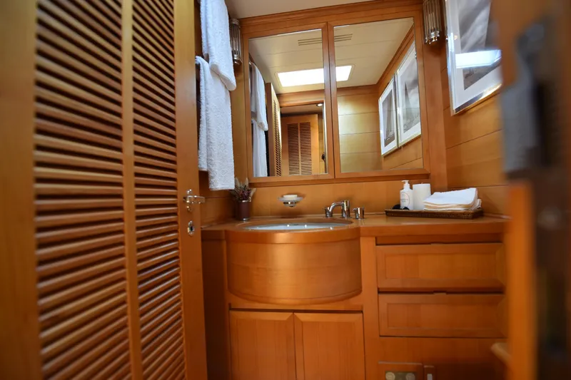 Green Eyes Yacht Photos Pics Luxurious wooden bathroom interior on 2001 Wally Full Displacement Sailing Yacht.
