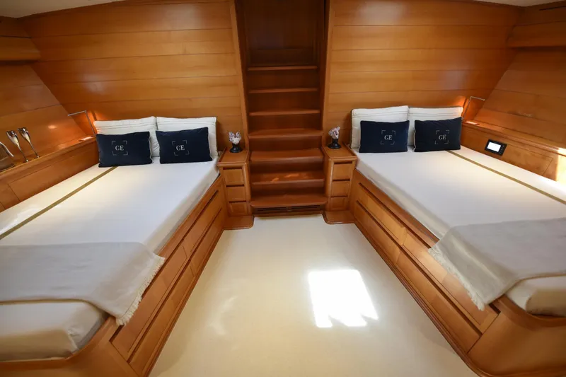 Green Eyes Yacht Photos Pics Luxurious wooden cabin interior of 2001 Wally Full Displacement Sailing Yacht with twin beds.