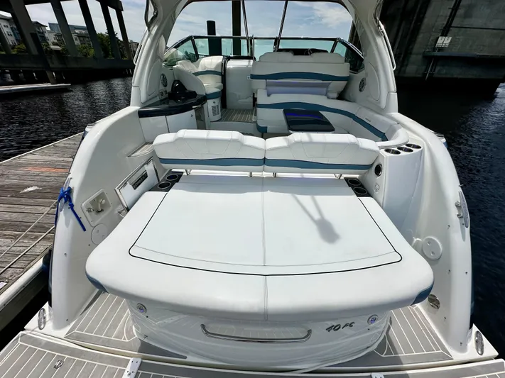 Brett Stancill Yacht Photos Pics 2019 Formula 40 Performance Cruiser, spacious deck with seating, docked by the water.