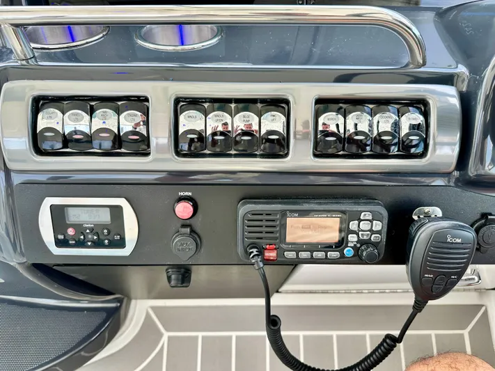 Brett Stancill Yacht Photos Pics Control panel of a 2019 Formula 40 Performance Cruiser with switches and communication devices.