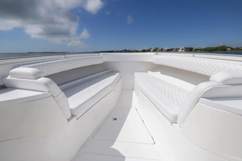  Yacht Photos Pics Luxurious seating on 2023 HCB 39 Speciale boat, featuring elegant white upholstery.