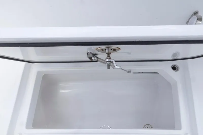  Yacht Photos Pics Open storage compartment in 2023 HCB 39 Speciale boat, featuring a sleek white interior.