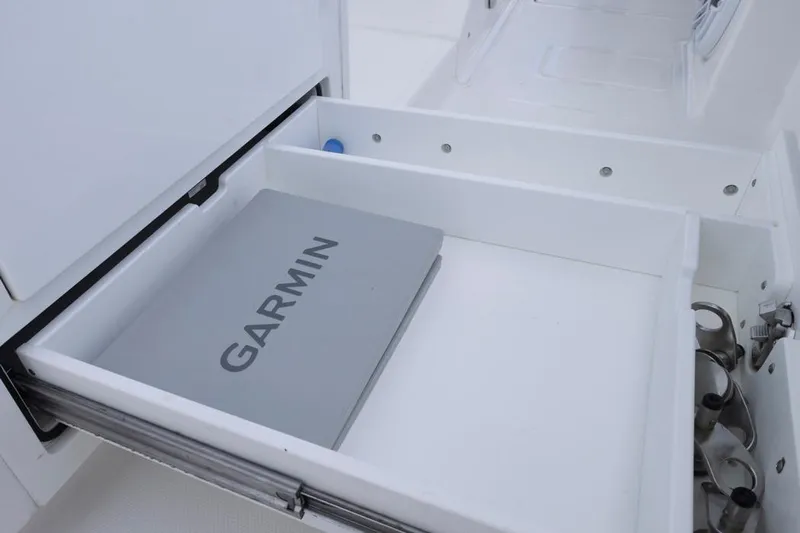  Yacht Photos Pics Open drawer on 2023 HCB 39 Speciale boat with Garmin device inside.