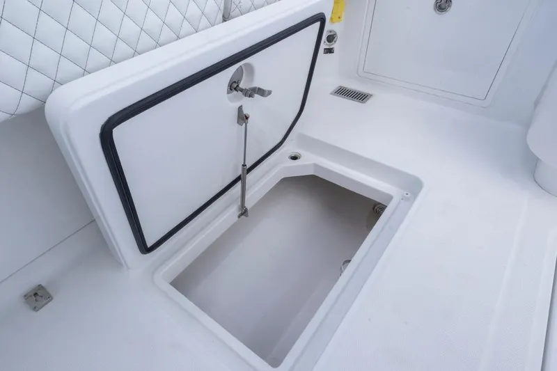  Yacht Photos Pics 2023 HCB 39 Speciale boat storage compartment with open hatch.