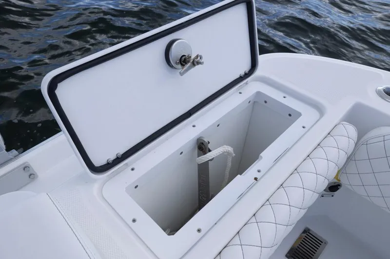 Yacht Photos Pics 2023 HCB 39 Speciale boat storage compartment with open hatch, showing interior details.
