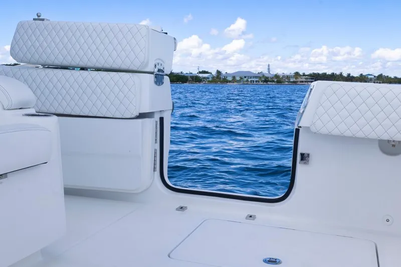  Yacht Photos Pics 2023 HCB 39 Speciale boat interior with open door, overlooking blue ocean and sky.