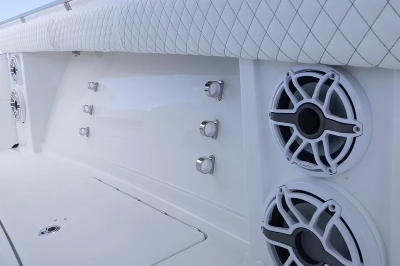  Yacht Photos Pics 2023 HCB 39 Speciale boat interior with speakers and quilted upholstery.