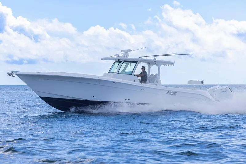  Yacht Photos Pics 2023 HCB 39 Speciale boat cruising on open water under a clear sky.