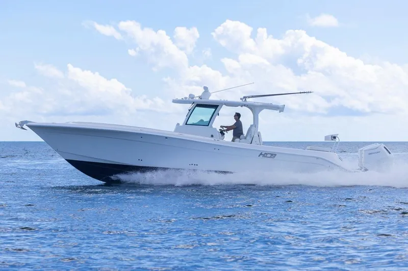 Yacht Photos Pics 2023 HCB 39 Speciale boat cruising on open water under a clear sky.