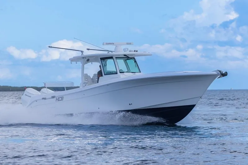  Yacht Photos Pics 2023 HCB 39 Speciale boat cruising on open water under a clear blue sky.