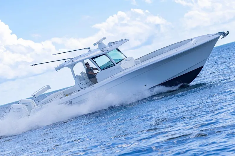  Yacht Photos Pics 2023 HCB 39 Speciale boat cruising on open water under a clear sky.