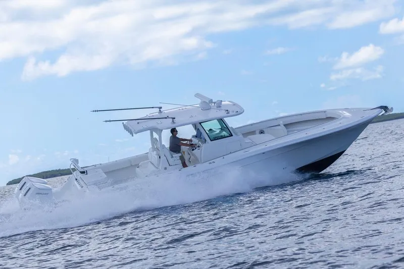  Yacht Photos Pics 2023 HCB 39 Speciale boat cruising on open water under a clear sky.