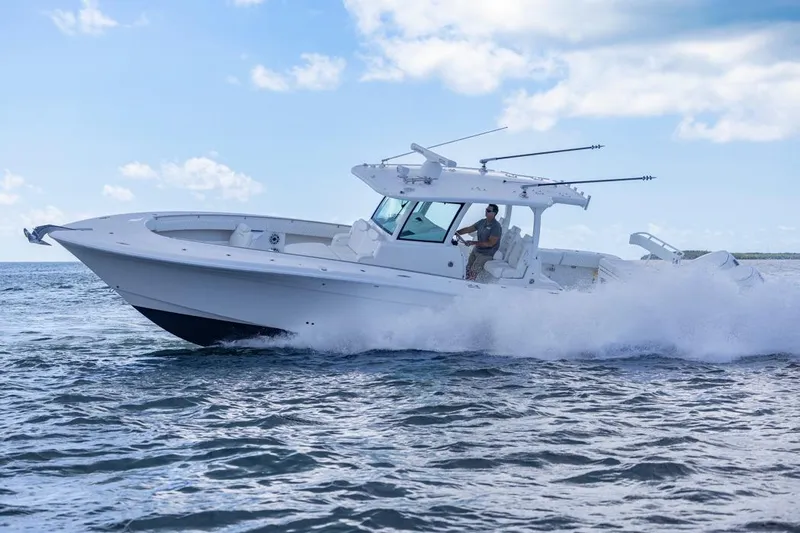  Yacht Photos Pics 2023 HCB 39 Speciale boat cruising on open water under a clear sky.