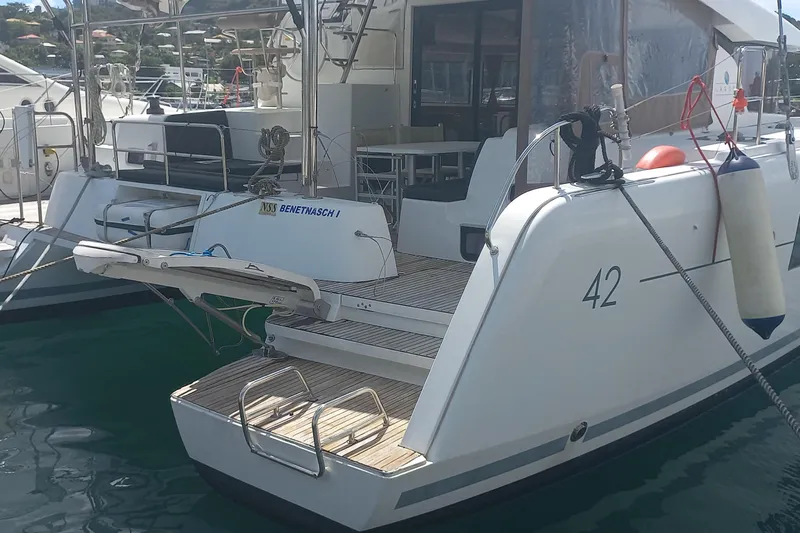 Benetnash II Yacht Photos Pics 2016 Lagoon 42 catamaran docked, featuring spacious deck and modern design.
