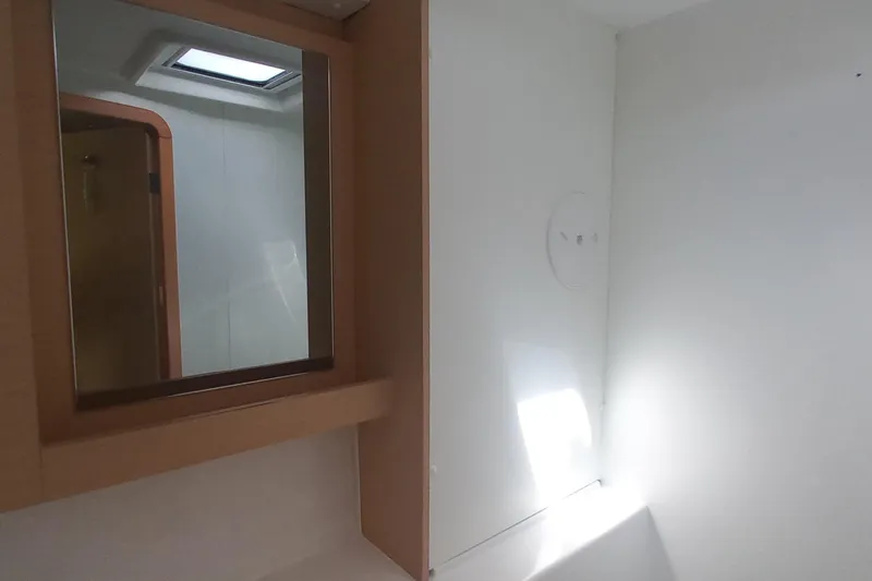 Benetnash II Yacht Photos Pics Interior of 2016 Lagoon 42 yacht bathroom with mirror and skylight.