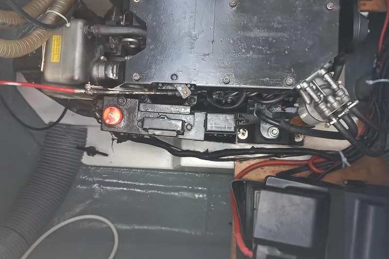 Benetnash II Yacht Photos Pics Engine compartment of a 2016 Lagoon 42 catamaran, showing mechanical components and wiring.