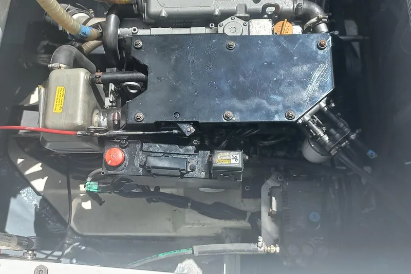 Benetnash II Yacht Photos Pics Engine compartment of a 2016 Lagoon 42 catamaran, showcasing mechanical components.