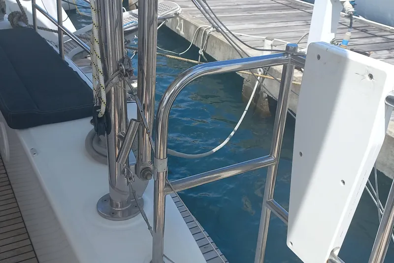 Benetnash II Yacht Photos Pics Lagoon 42 catamaran deck, 2016 model, docked at marina with visible railing and ropes.