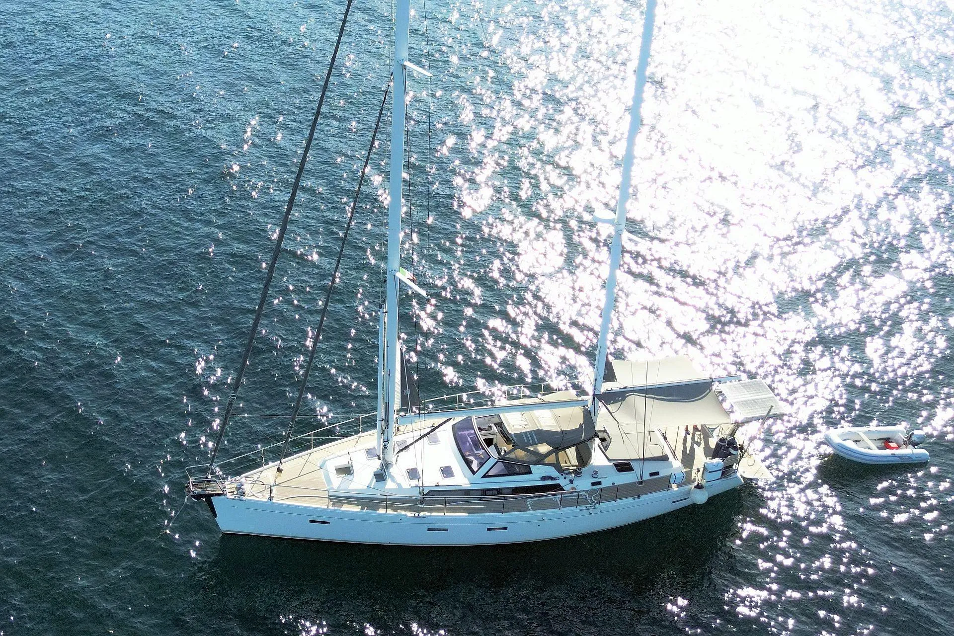 2015 Amel 55 sailing yacht on open sea.