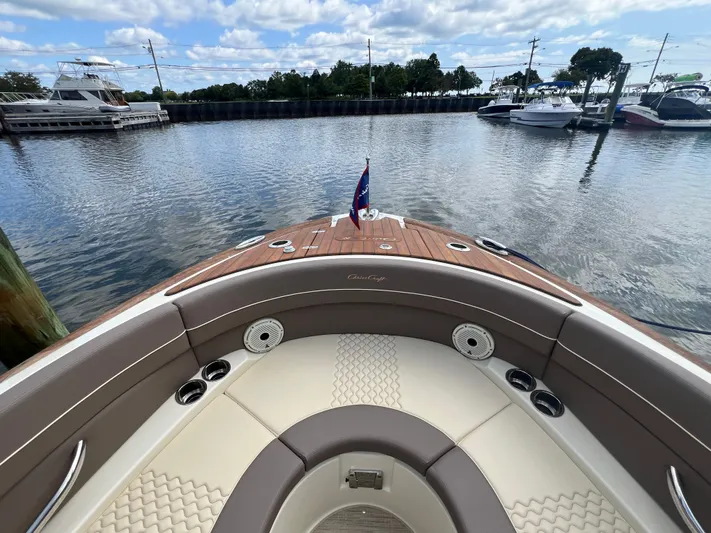  Yacht Photos Pics 2023 Chris-Craft Launch 28 GT boat interior with elegant seating and waterfront view.