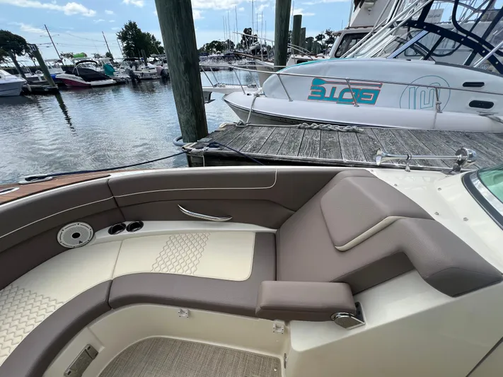  Yacht Photos Pics 2023 Chris-Craft Launch 28 GT luxury boat interior at marina dock.