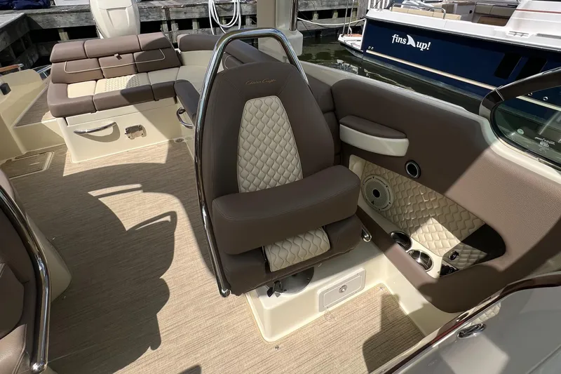  Yacht Photos Pics Luxurious interior of 2023 Chris-Craft Launch 28 GT boat with elegant seating.