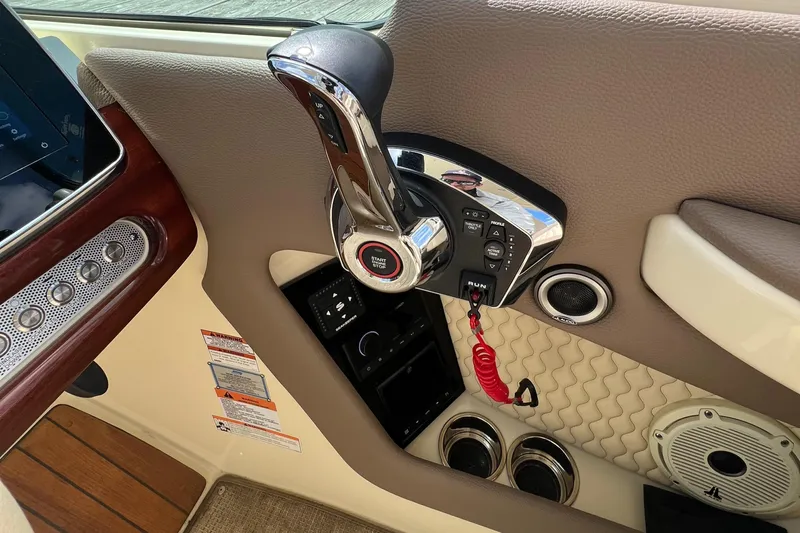  Yacht Photos Pics 2023 Chris-Craft Launch 28 GT boat control panel with throttle and speaker.