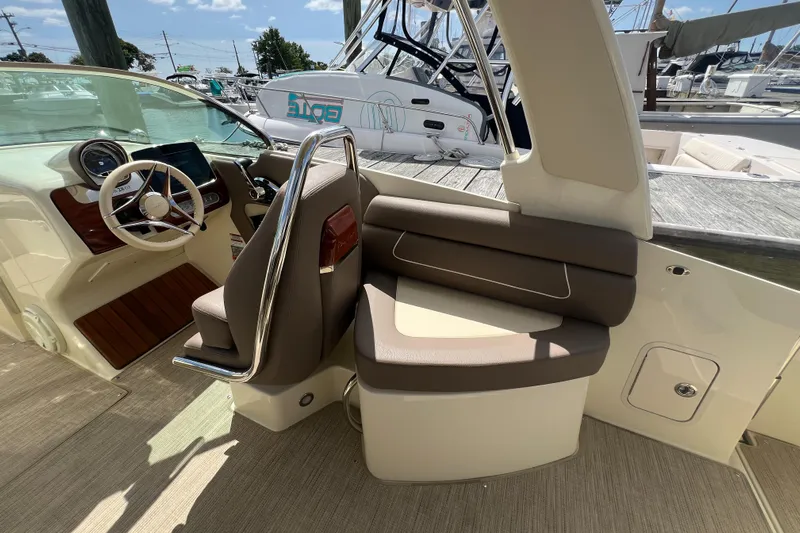  Yacht Photos Pics 2023 Chris-Craft Launch 28 GT interior with luxurious seating and modern dashboard.
